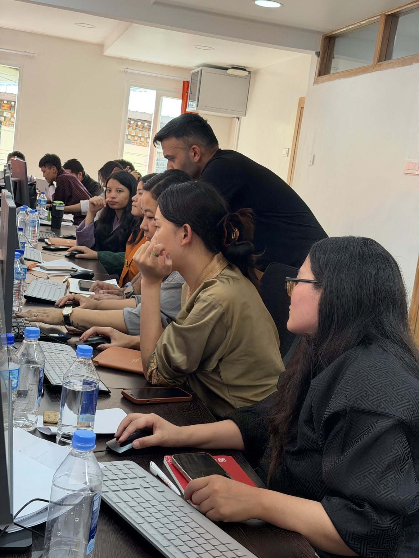 A hands-on AI session, laptops open
